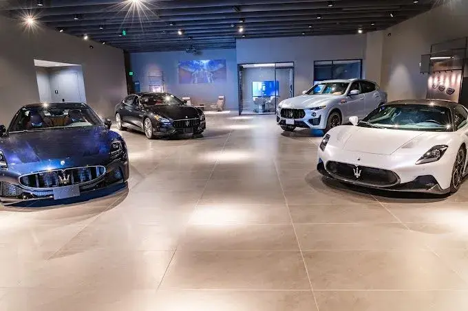 Large format tile floor in a luxury car showroom